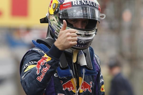 Vettel se mostró contento por la pole que consiguió este sábado en Sao Paulo. (Foto Prensa Libre: AFP) 