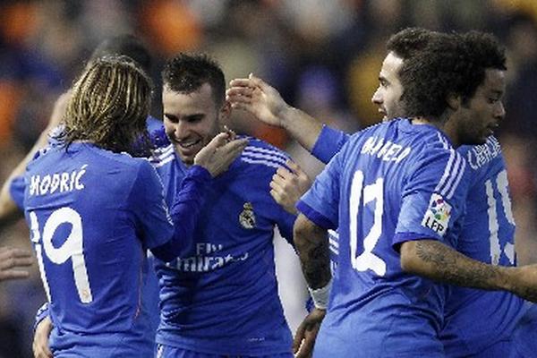 Con goles de Di María, Cristiano Ronaldo y Jesé, el Real Madrid venció 3-2 al Valencia. (Foto Prensa Libre: AP)