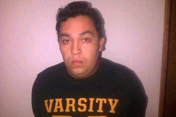 Óscar Arango, sindicado de asesinato, permanece en la sede de la División Especializada en Investigación Criminal, en Xela. (Foto Prensa Libre: Alejandra Martínez)