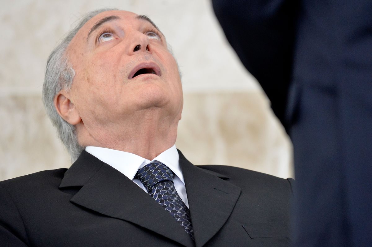 El presidente interino de Brasil, Michel Temer, enfrenta otro momnto incómodo al hacerse público el patrimonio de su hijo. (Foto Prensa Libre: AFP).