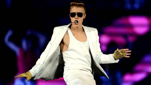 Justin Bieber ha sido fotografiado en varias ocasiones como Dios lo trajo al mundo. (Foto Prensa Libre: AP)