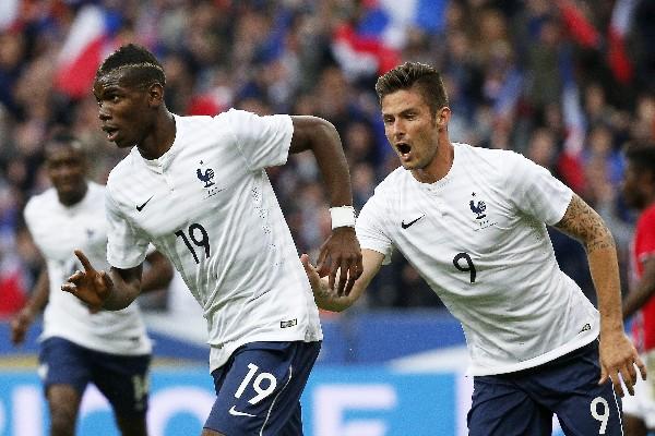 Paul Pogba celebra, después de anotar, en el triunfo 4-0 de Francia sobre Noruega, en amistoso previo al Mundial de Brasil 2014. (Foto Prensa Libre: EFE)