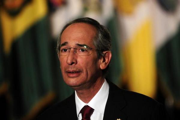 Presidente Álvaro Colom, durante la presentación del informe. (Foto: EFE)