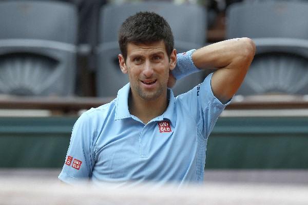 El tenista Novak Djokovic ve a España, Brasil y Alemania como favoritos para el Mundial de Brasil 2014. (Foto Prensa Libre: AFP)