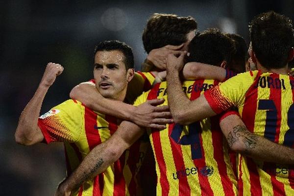 Con tres goles de Pedro y dos de Cesc Fábregas, el Barcelona venció 5-2 al Getafe. (Foto Prensa Libre: AFP)