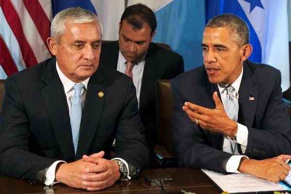 El presidente Otto Pérez Molina durante la reunión con Barack Obama, para tratar el tema de la migración infantil. (Foto Prensa Libre:  AP)