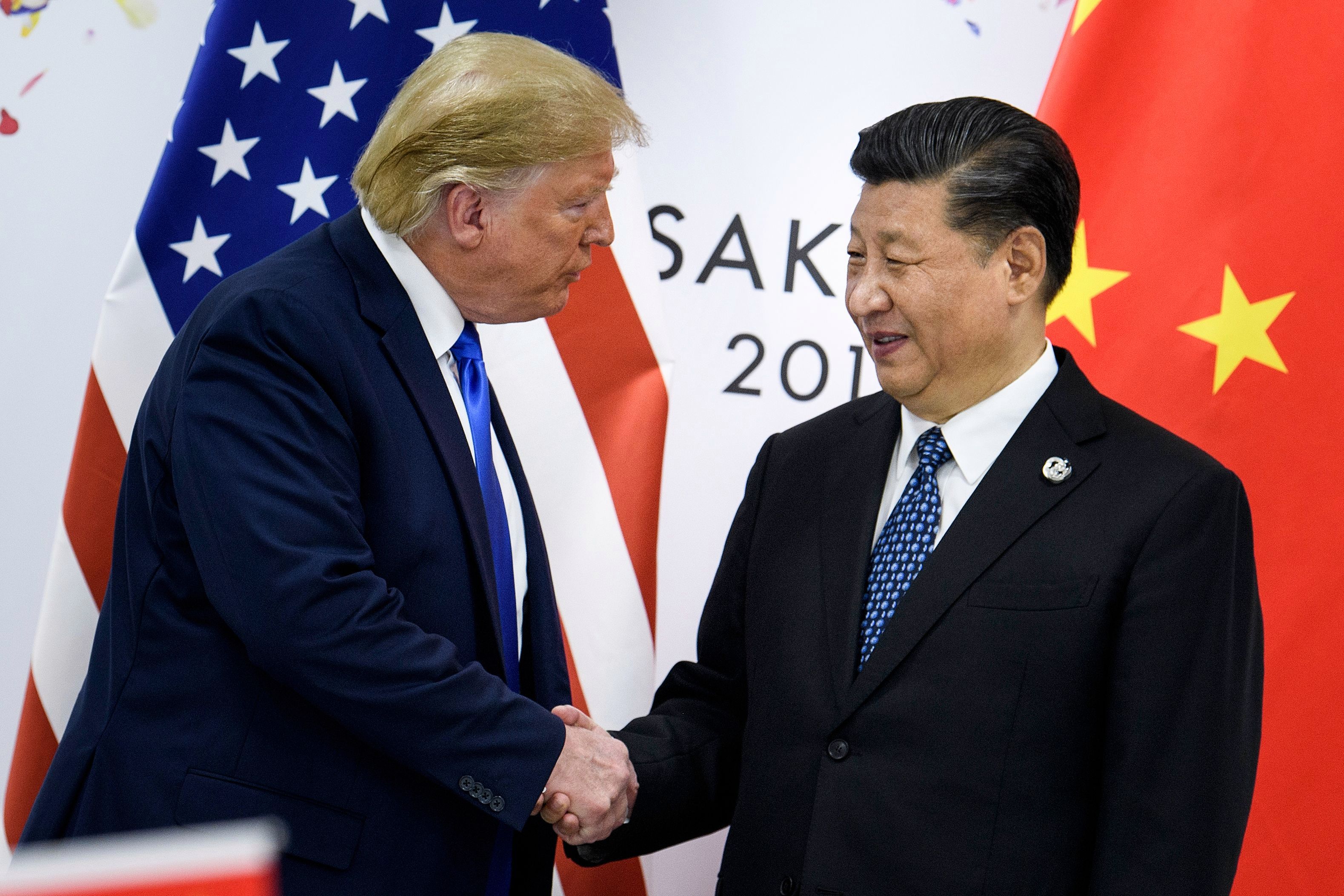 Donald Trump (izq), presidente de EE. UU., y Xi Jimping, presidente de China. (Foto Prensa Libre: AFP)