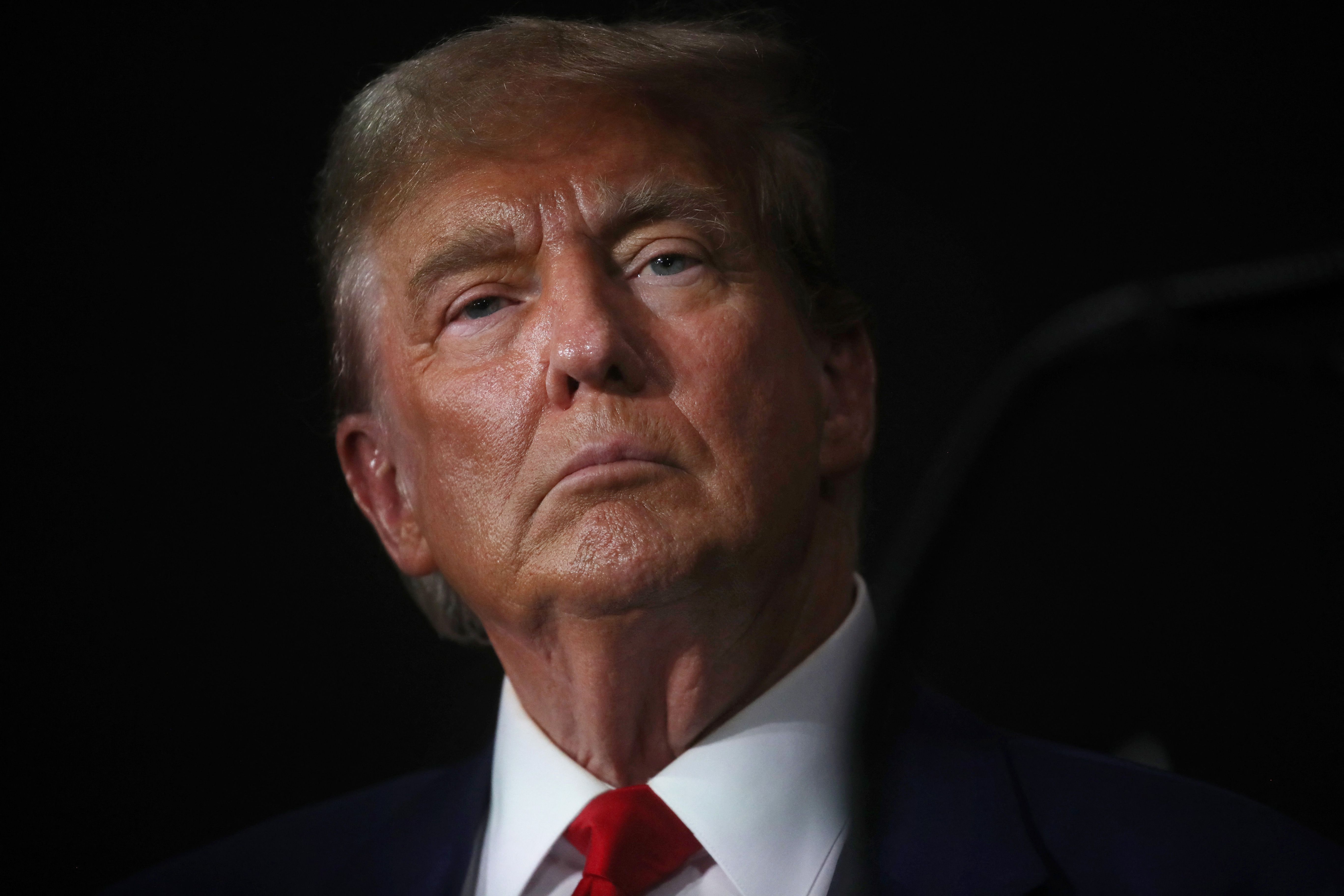 GRAND RAPIDS, MICHIGAN - APRIL 02: Former U.S. President Donald Trump attends a campaign event on April 02, 2024 in Grand Rapids, Michigan. Trump delivered a speech which his campaign has called "Biden's Border Bloodbath", as recent polls have shown that immigration and the situation at the U.S. Southern border continue to be top issues on voters' minds going into the November election.   Spencer Platt/Getty Images/AFP (Photo by SPENCER PLATT / GETTY IMAGES NORTH AMERICA / Getty Images via AFP)