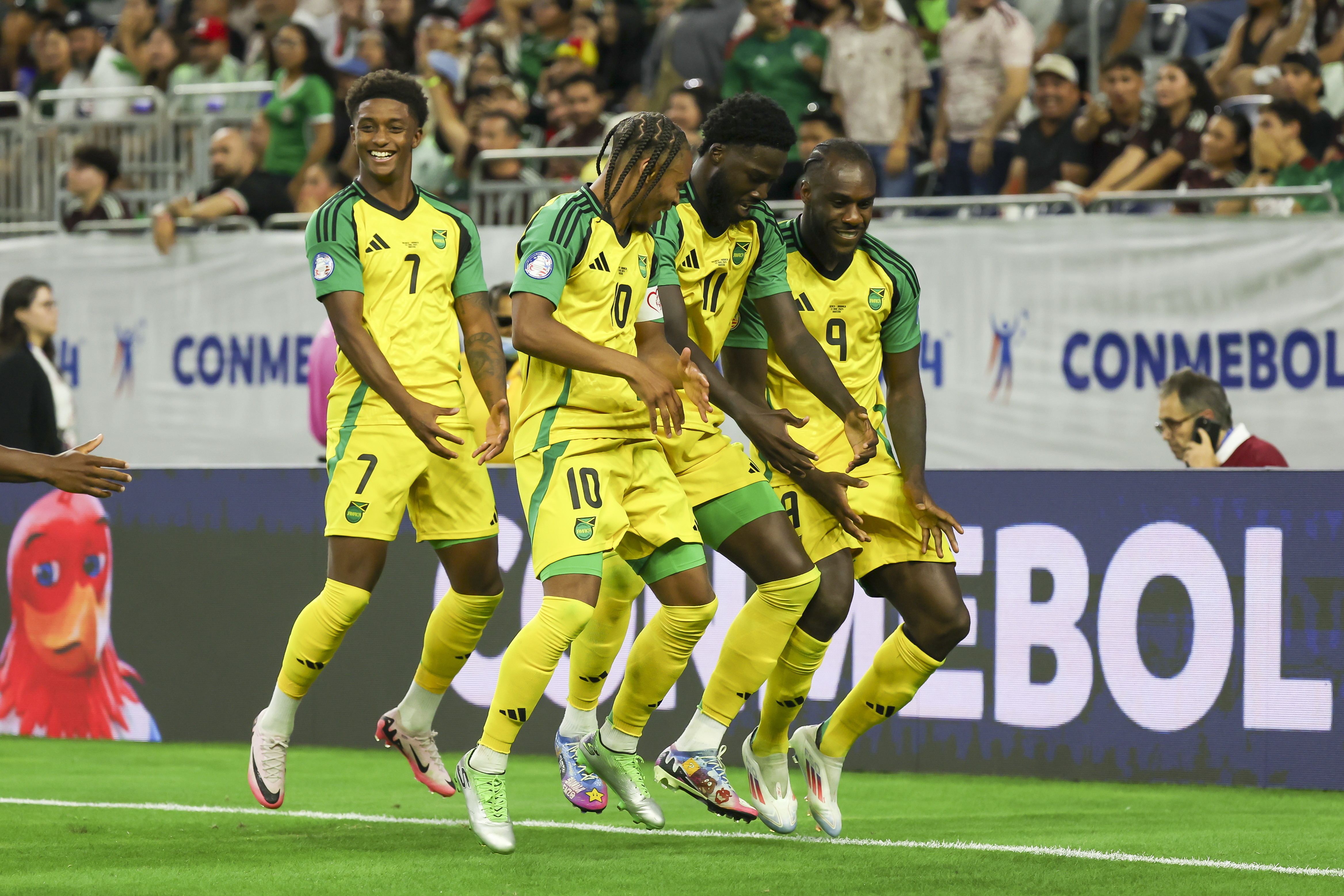 Houston (United States), 23/06/2024.- Players from Jamaica (L-R) Demarai Gray, Bobby Decordova Reid, Shamar Nicholson, and Michail Antonio celebrate a goal which was later recalled during the second half of the CONMEBOL Copa America 2024 group B match between Mexico and Jamaica, in Houston, Texas, USA, 22 June 2024. (Córdoba) EFE/EPA/LESLIE PLAZA JOHNSON FOR EDITORIAL USE ONLY. Icon Sportswire (A Division of XML Team Solutions) reserves the right to pursue unauthorized users of this image. If you violate our intellectual property you may be liable for: actual damages, loss of income, and profits you derive from the use of this image, and, where appropriate, the costs of collection and/or statutory damages up to $150,000 (USD).