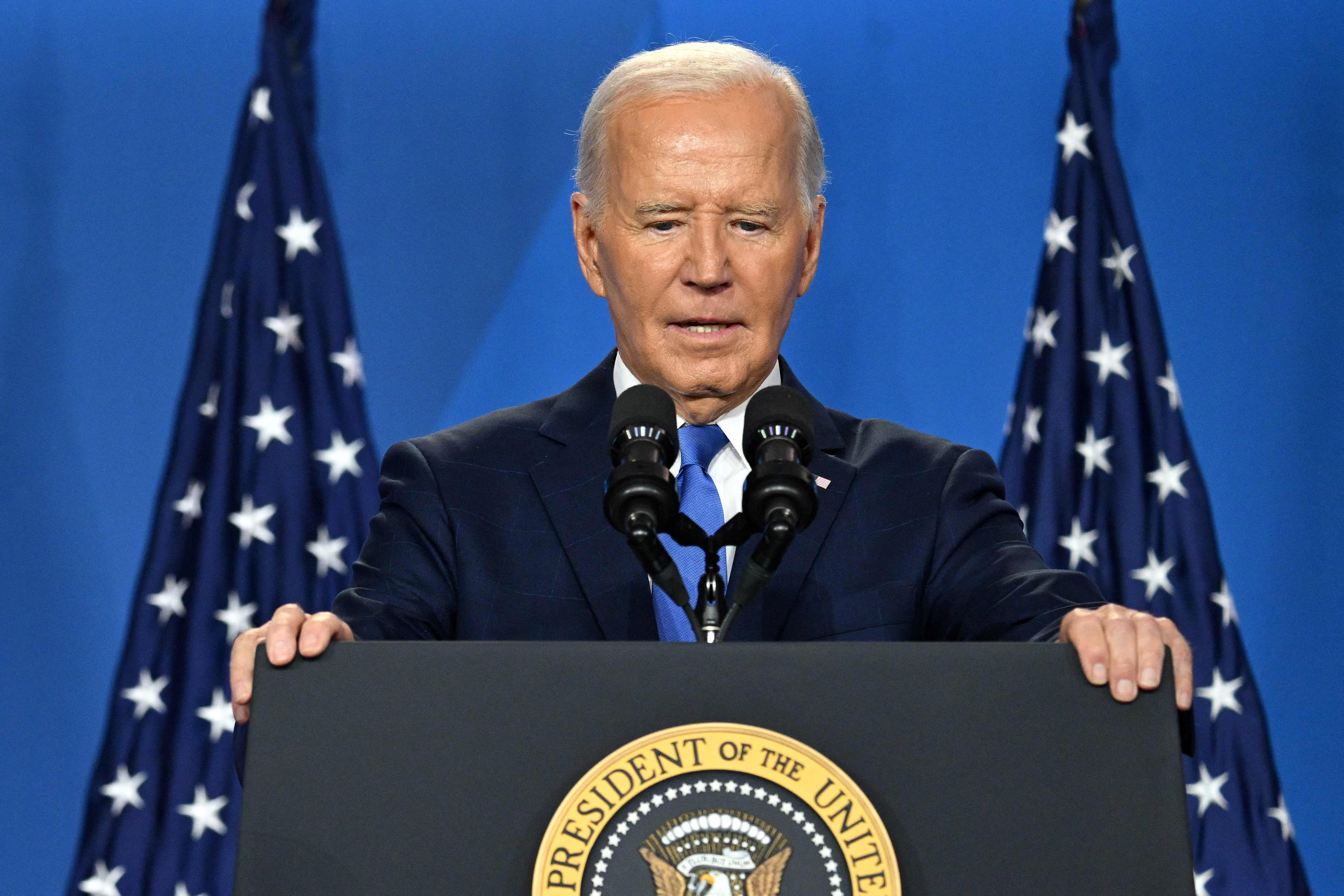 (FILES) US President Joe Biden gestures as he speaks during a press conference at the close of the 75th NATO Summit at the Walter E. Washington Convention Center in Washington, DC on July 11, 2024. US President Joe Biden announced July 21, 2024 that he is dropping out of his reelection battle with Donald Trump, in a historic move that plunges the already turbulent 2024 White House race into uncharted territory. (Photo by SAUL LOEB / AFP)