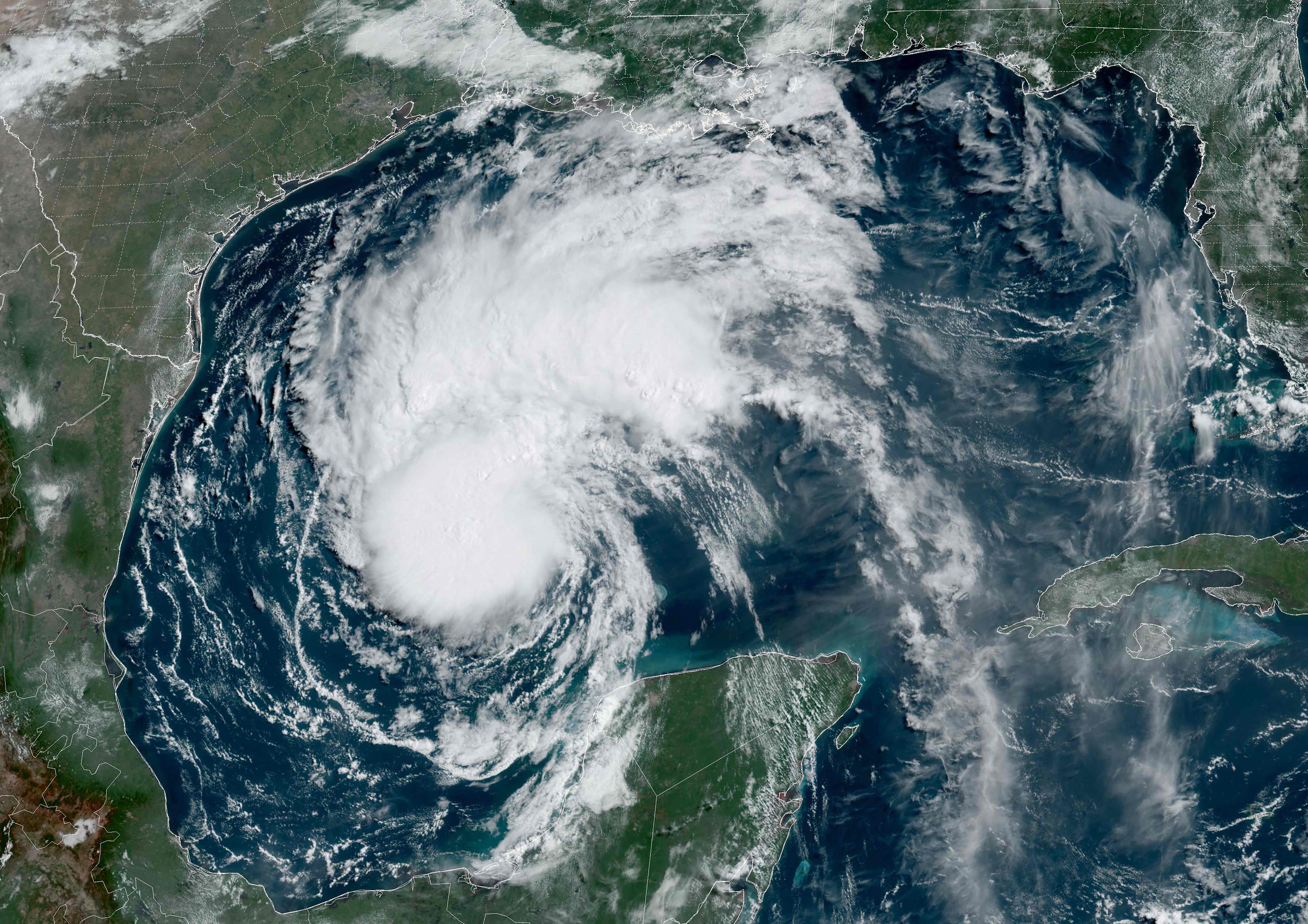 This National Oceanic and Atmospheric Administration (NOAA)/GOES satellite handout image shows Tropical Storm Beryl at 14:56 UTC on July 6, 2024, in the Gulf of Mexico. Beryl weakened to a tropical storm July 5 after hitting Mexico as a Category 2 hurricane, with fierce winds causing material damage but no injuries along the touristic Yucatan Peninsula. Beryl is expected to intensify as it moves toward northeastern Mexico and Texas by the end of the weekend, according to the Miami-based National Hurricane Center (NHC). (Photo by Handout / NOAA/GOES / AFP) / RESTRICTED TO EDITORIAL USE - MANDATORY CREDIT "AFP PHOTO / NOAA/GOES" - NO MARKETING NO ADVERTISING CAMPAIGNS - DISTRIBUTED AS A SERVICE TO CLIENTS