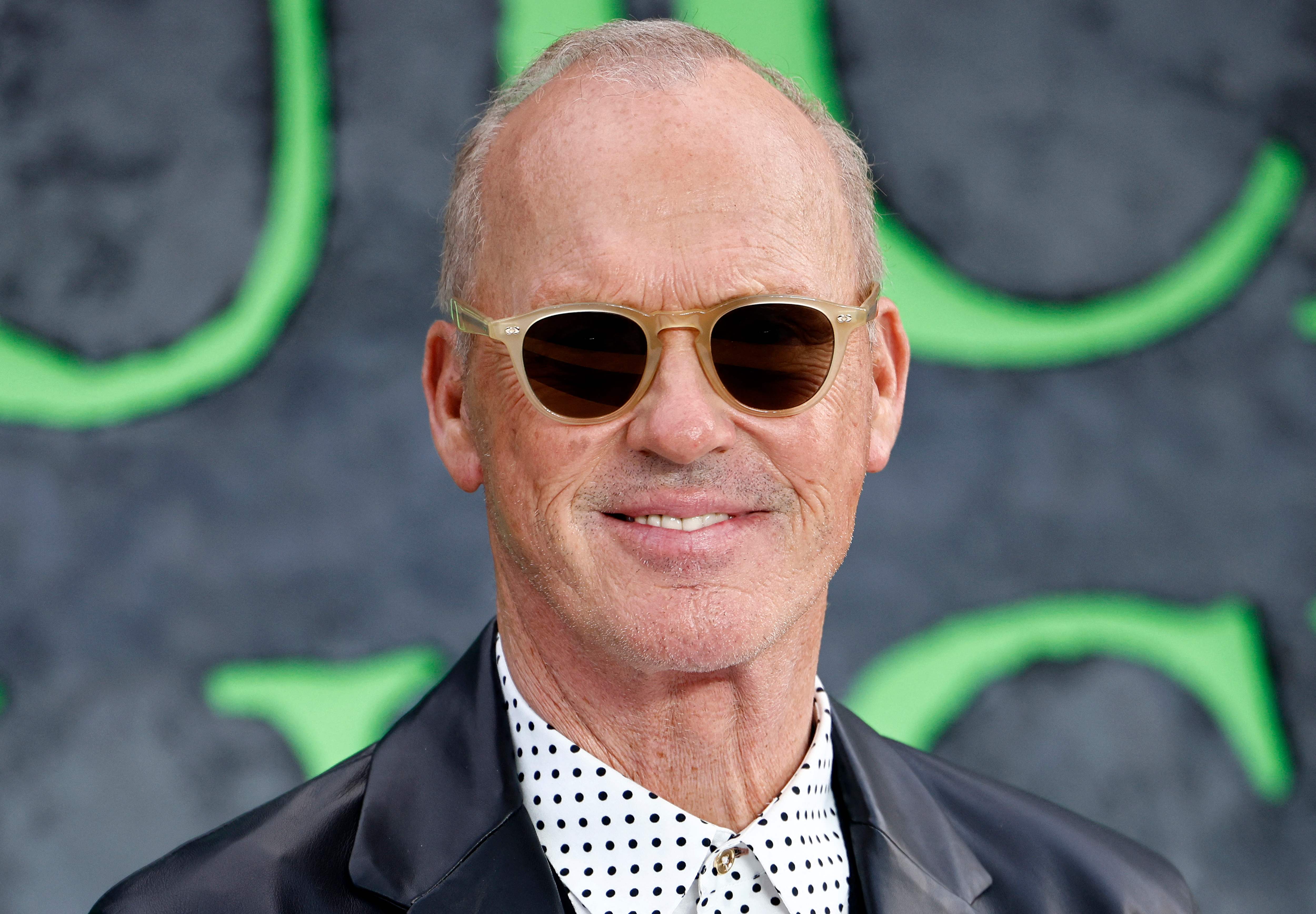 US actor Michael Keaton poses on the red carpet upon arrival to attend the UK premiere of the film "Beetlejuice Beetlejuice", in central London, on August 29, 2024. (Photo by BENJAMIN CREMEL / AFP)