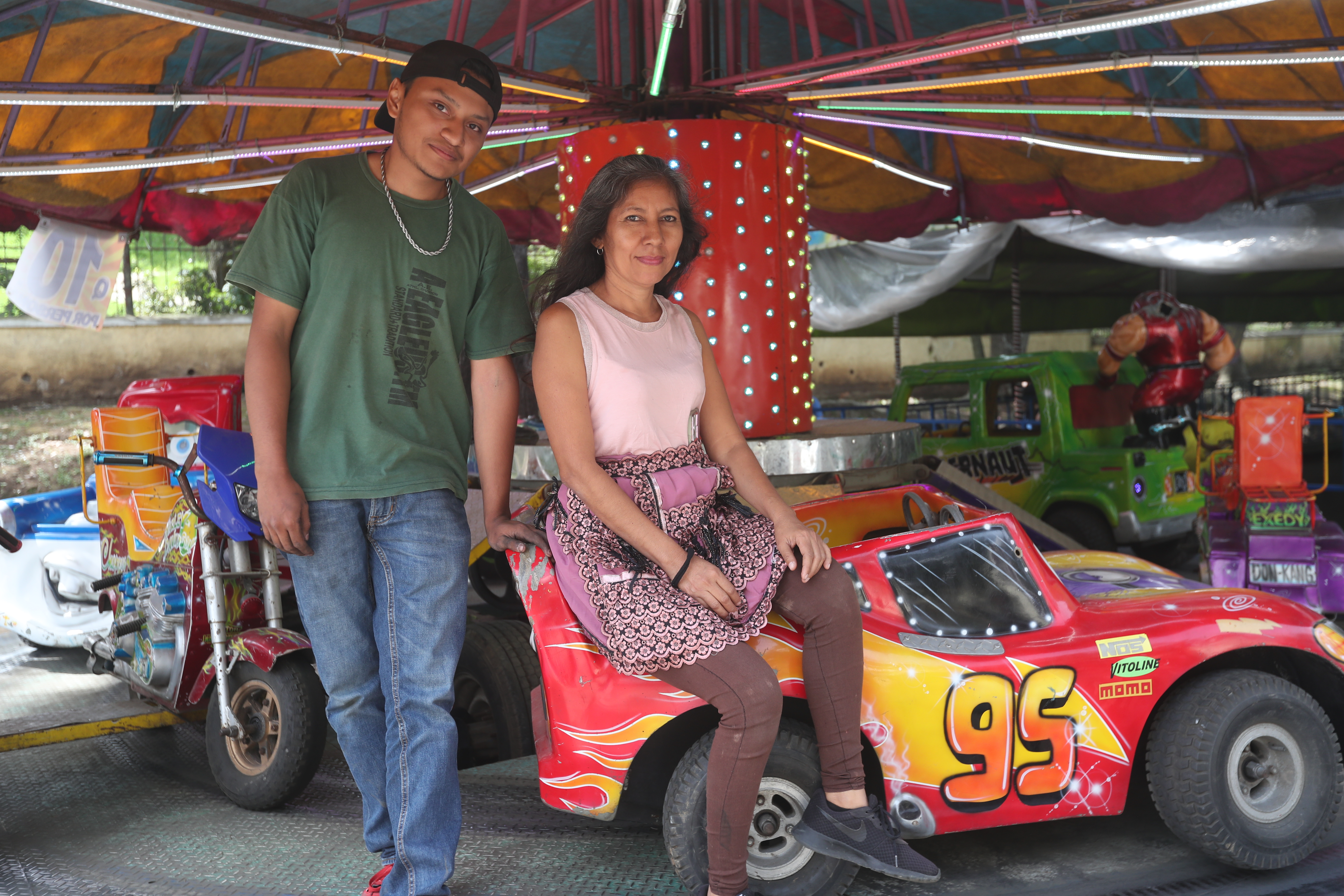 dueños de juegos mecánicos en la feria del Cerrito del Carmen'