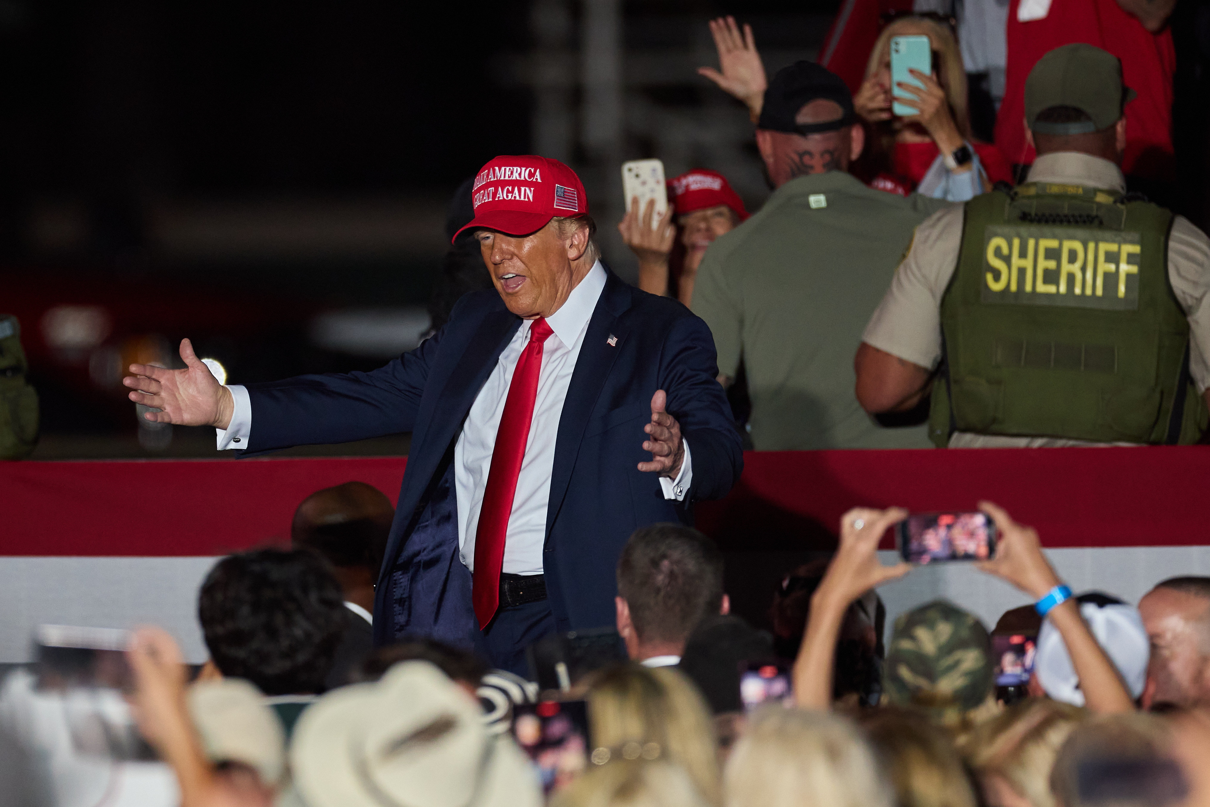 Coachella (United States), 12/10/2024.- Former US President and current Republican presidential nominee Donald Trump leaves after speaking during an election rally in Coachella, California, 12 October 2024. EFE/EPA/ALLISON DINNER