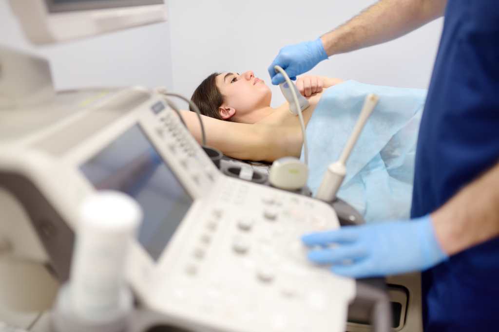 Woman undergoing a breast ultrasound