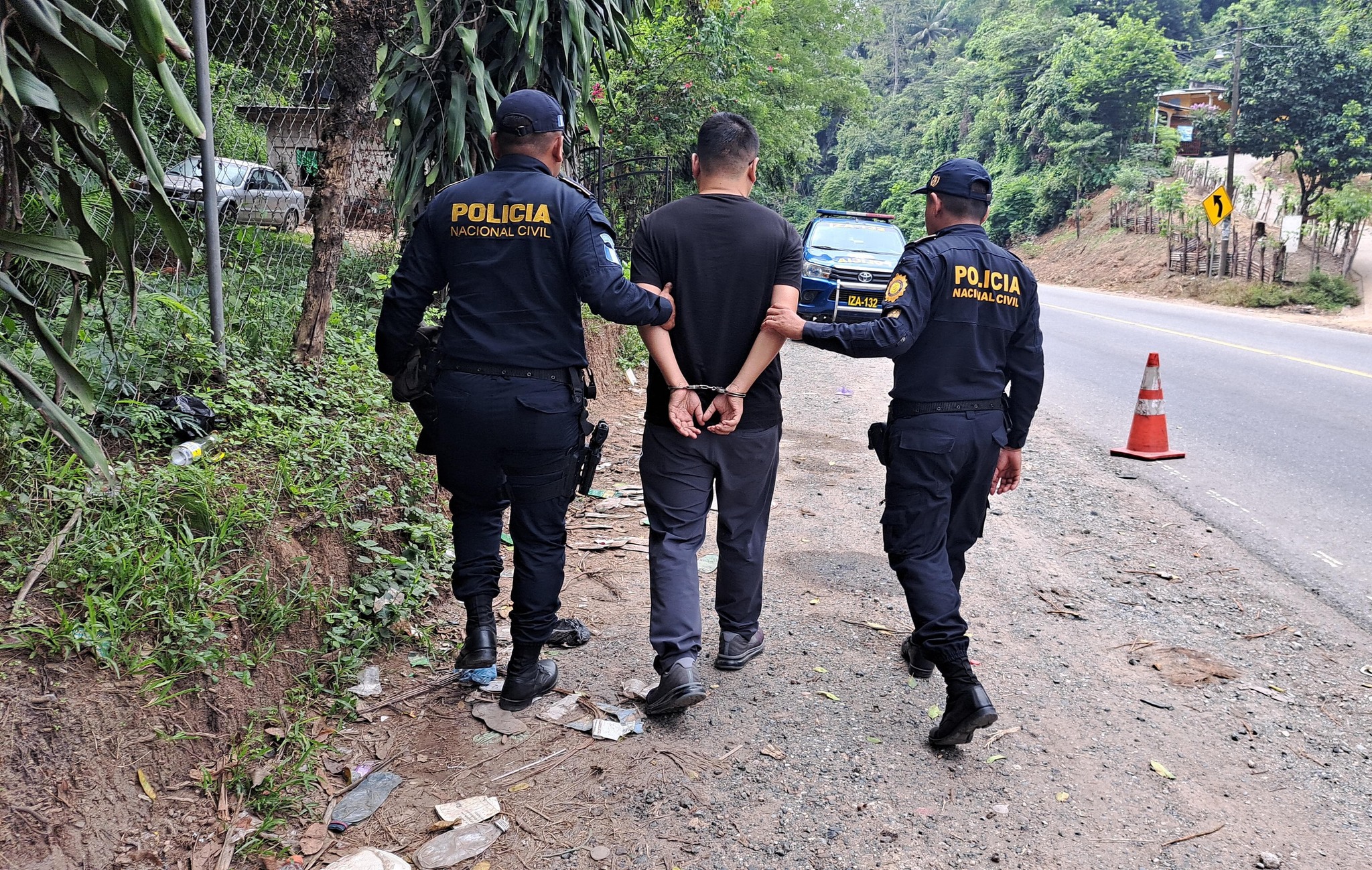 
Un ciudadano chino fue detenido en Izabal por portar ujna fuerte suma de dinero. (Foto Prensa Libre: PNC)
