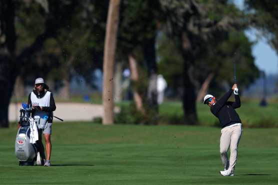 ST SIMONS ISLAND, GEORGIA - NOVEMBER 22: Ryo Hisatsune of Japan plays a shot on the eighth hole during the second round of The RSM Classic 2024 on the Plantation course at Sea Island Resort on November 22, 2024 in St Simons Island, Georgia.   Kevin C. Cox/Getty Images/AFP (Photo by Kevin C. Cox / GETTY IMAGES NORTH AMERICA / Getty Images via AFP)