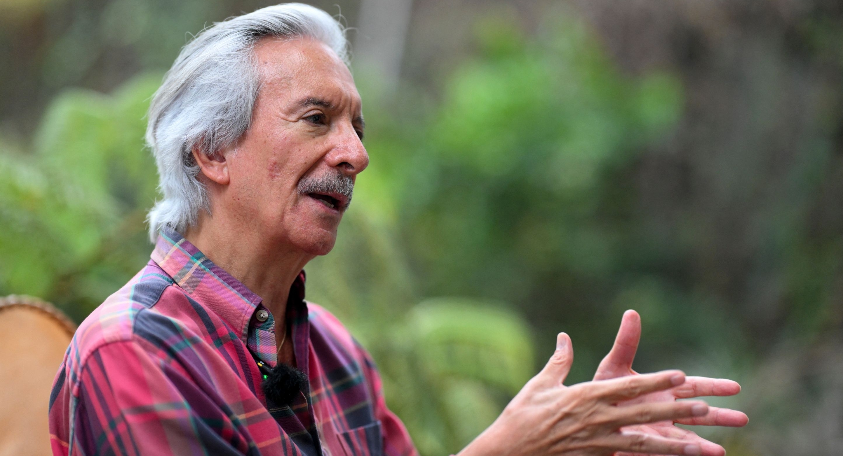 Guatemalan journalist Jose Ruben Zamora, founder of the defunct El Periódico newspaper, gestures during an interview with AFP at his house in Guatemala City on November 11, 2024. Guatemalan journalist Jose Ruben Zamora was released from prison on October 19 after a judge granted the request for him to be placed under house arrest. A stark critic of the government of former right-wing president Alejandro Giammattei, Zamora had been detained on money laundering charges for more than 800 days. (Photo by JOHAN ORDONEZ / AFP)