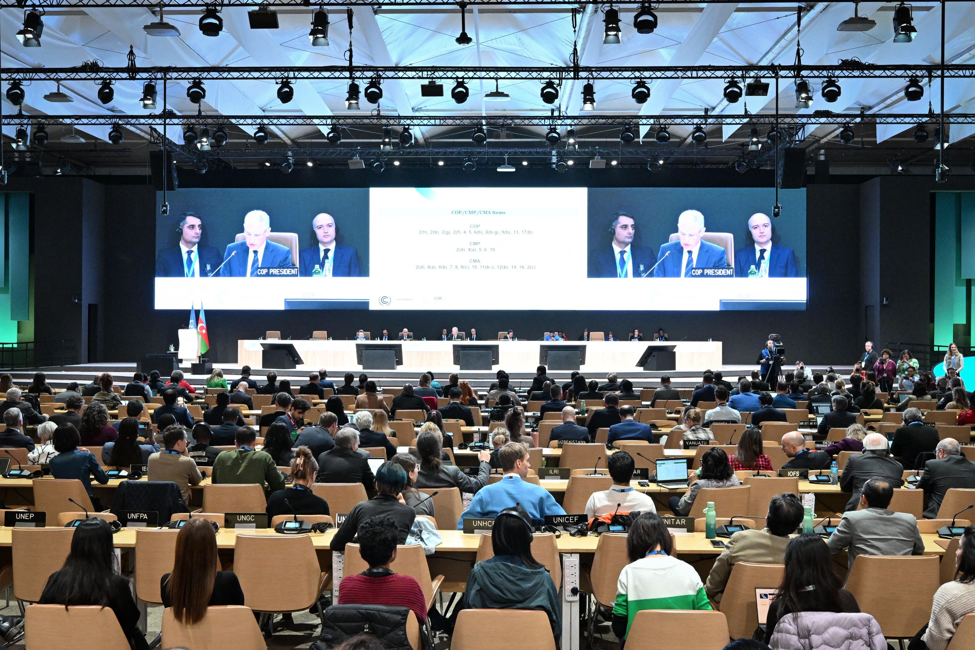 COP29 President Mukhtar Babayev speaks at a first closing plenary of the COP29 Climate Conference in Baku on November 23, 2024. The Azerbaijani head of COP29 urged nations on November 23, to bridge their differences after two weeks of fraught negotiations at the UN climate talks over money to help poorer countries tackle global warming. (Photo by STRINGER / AFP)