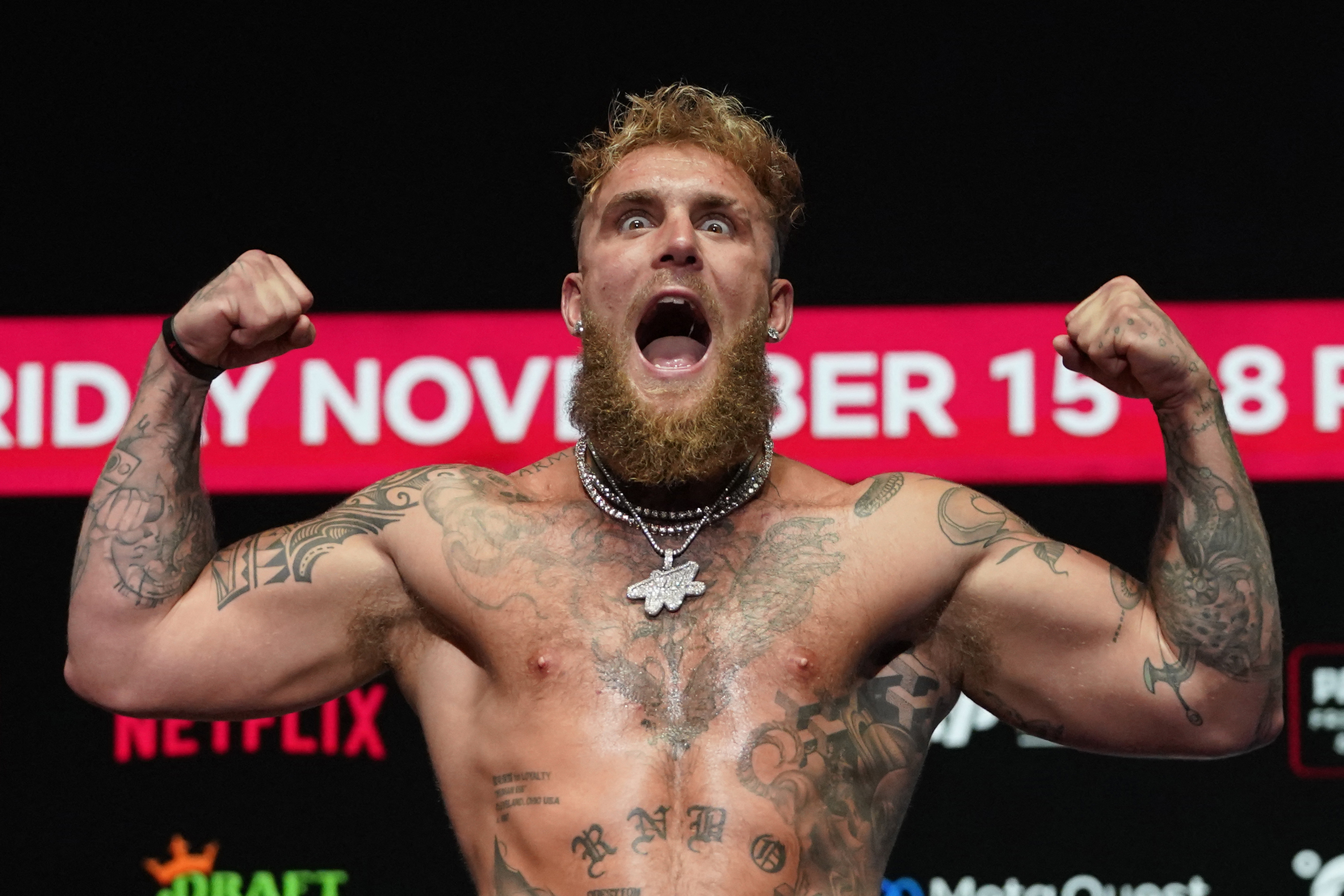 US boxer and actor Jake Paul gestures during his weigh-in ahead of his heavyweight boxing match against Former US heavyweight boxing champion Mike Tyson in Irving, Texas, on November 14, 2024. (Photo by TIMOTHY A. CLARY / AFP) / ALTERNATE CROP