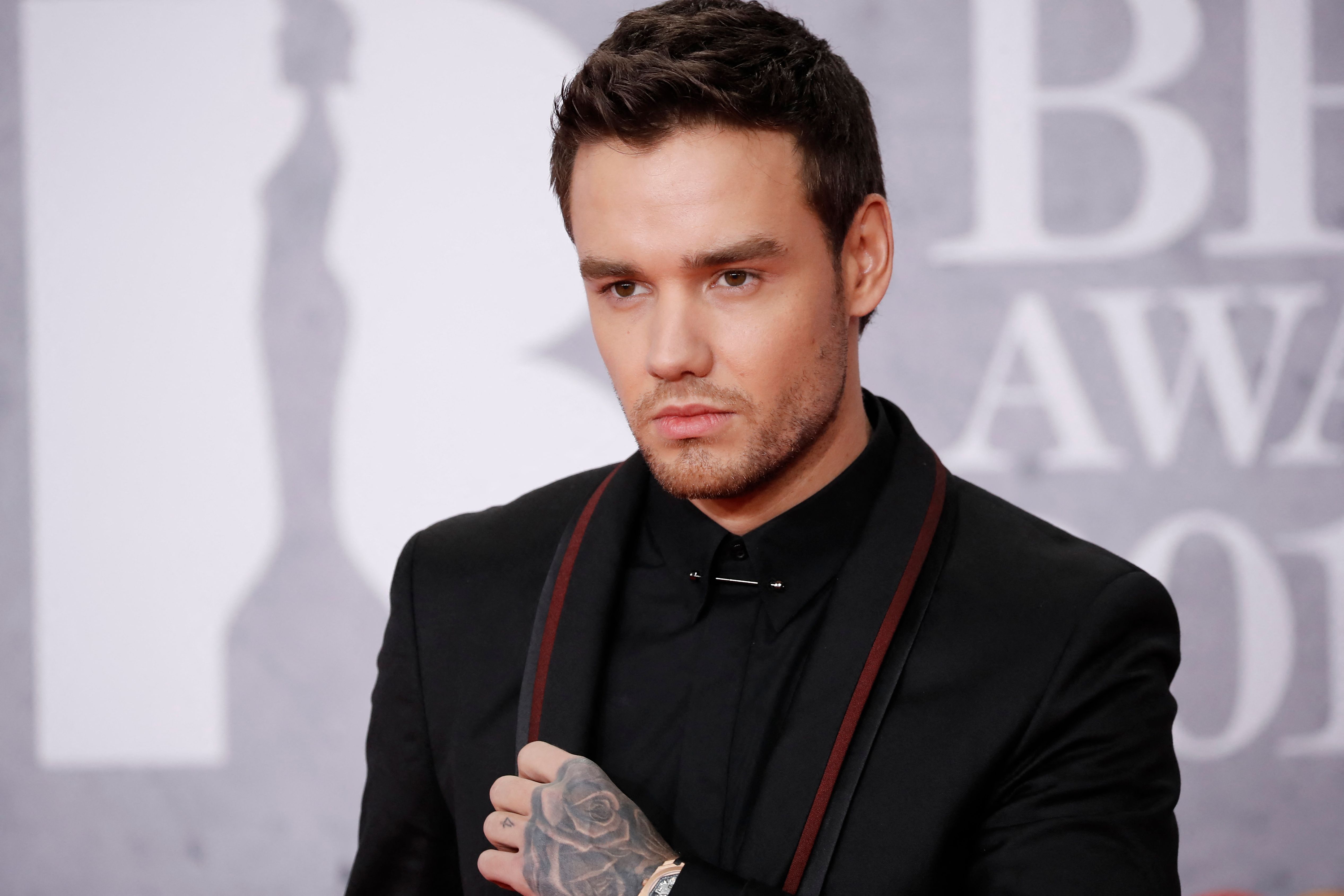 (FILES) British singer-songwriter Liam Payne poses on the red carpet on arrival for the BRIT Awards 2019 in London on February 20, 2019. British former One Direction star Liam Payne consumed cocaine, alcohol and a prescription antidepressant before falling to his death from a Buenos Aires hotel balcony, Argentine prosecutors said on November 7, 2024. (Photo by Tolga AKMEN / AFP)