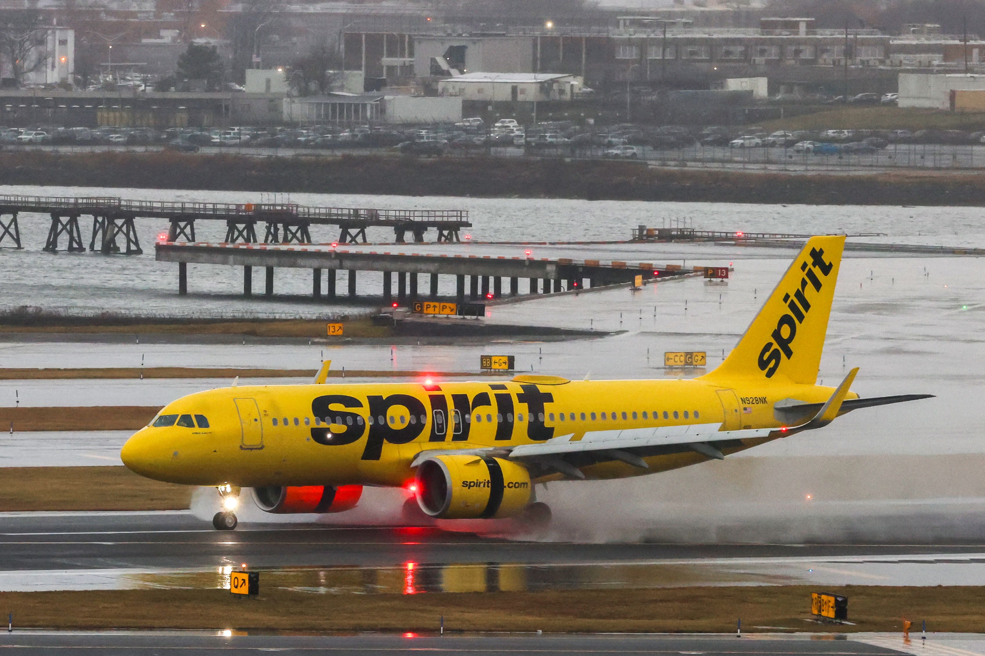 (FILES) An Airbus A320 passengers aircraft of Spirit airlines arriving from Miami is pictured at La Guardia Airport on January 9, 2024. US low-cost carrier Spirit Airlines grappling with financial woes announced on November 18, 2024, it had filed for bankruptcy as part of a restructuring agreement with its creditors. (Photo by Charly TRIBALLEAU / AFP)