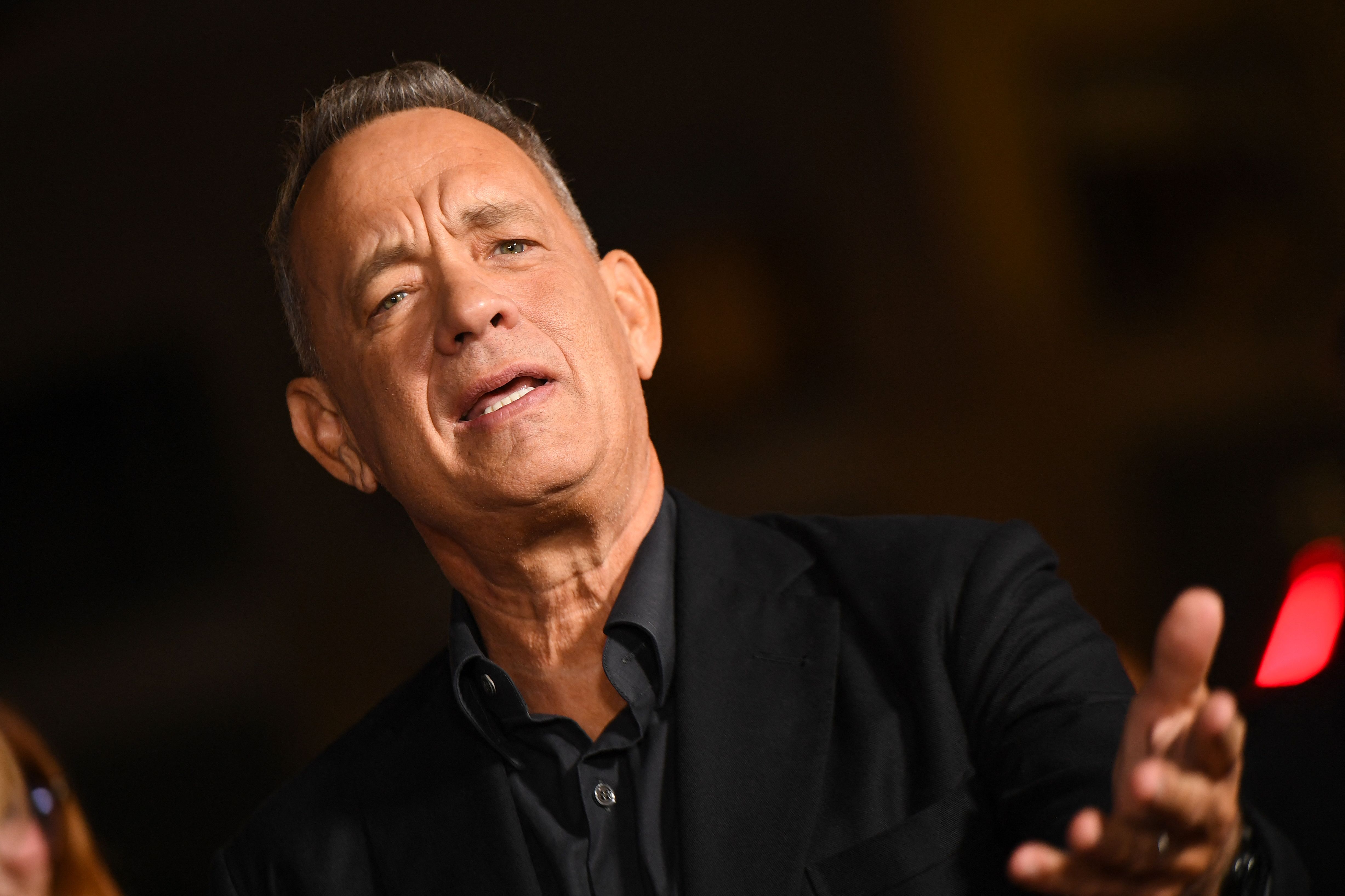 US actor Tom Hanks attends the world premiere of "Here" during AFI Fest at the TCL Chinese Theatre in Hollywood on October 25, 2024. (Photo by VALERIE MACON / AFP)