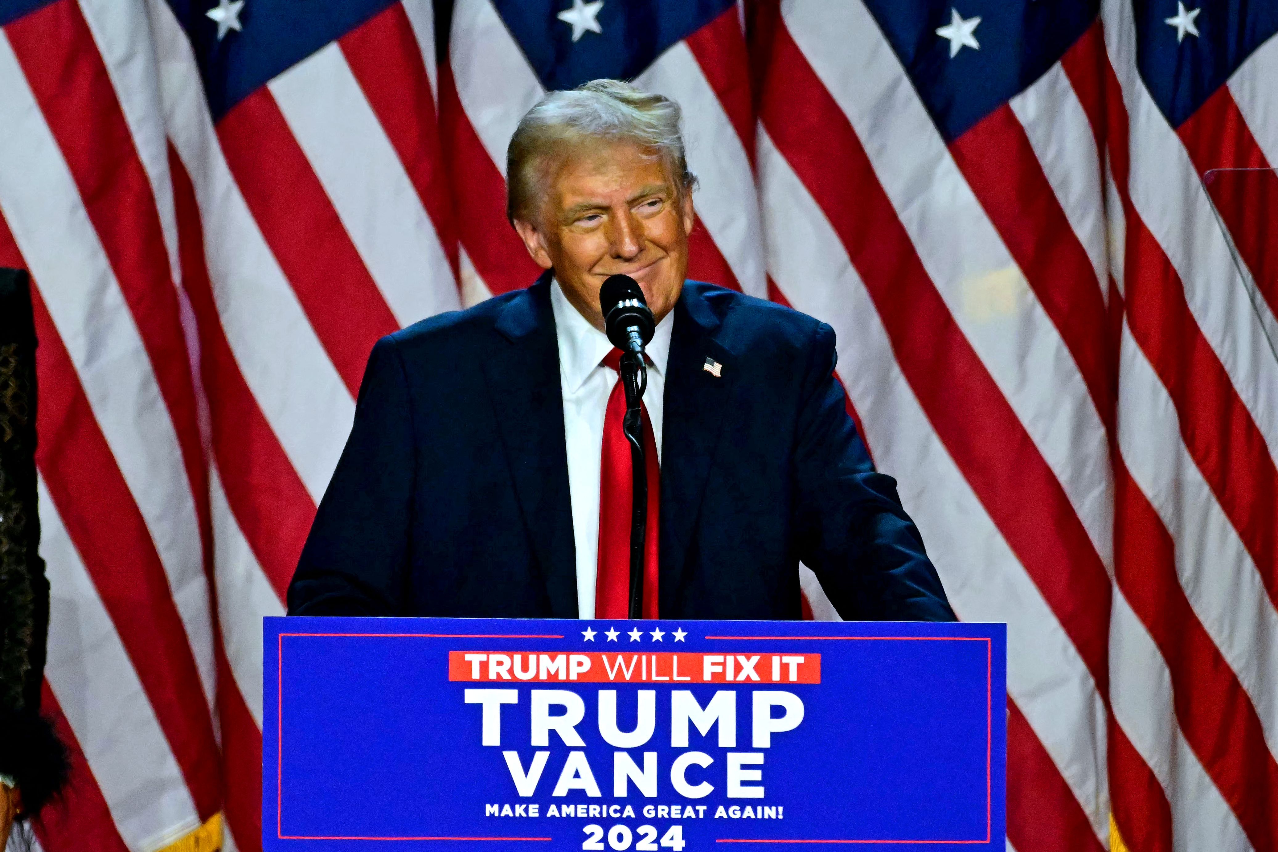 Former US President and Republican presidential candidate Donald Trump speaks during an election night event at the West Palm Beach Convention Center in West Palm Beach, Florida, on November 6, 2024. Republican former president Donald Trump closed in on a new term in the White House early November 6, 2024, just needing a handful of electoral votes to defeat Democratic Vice President Kamala Harris. (Photo by Jim WATSON / AFP)