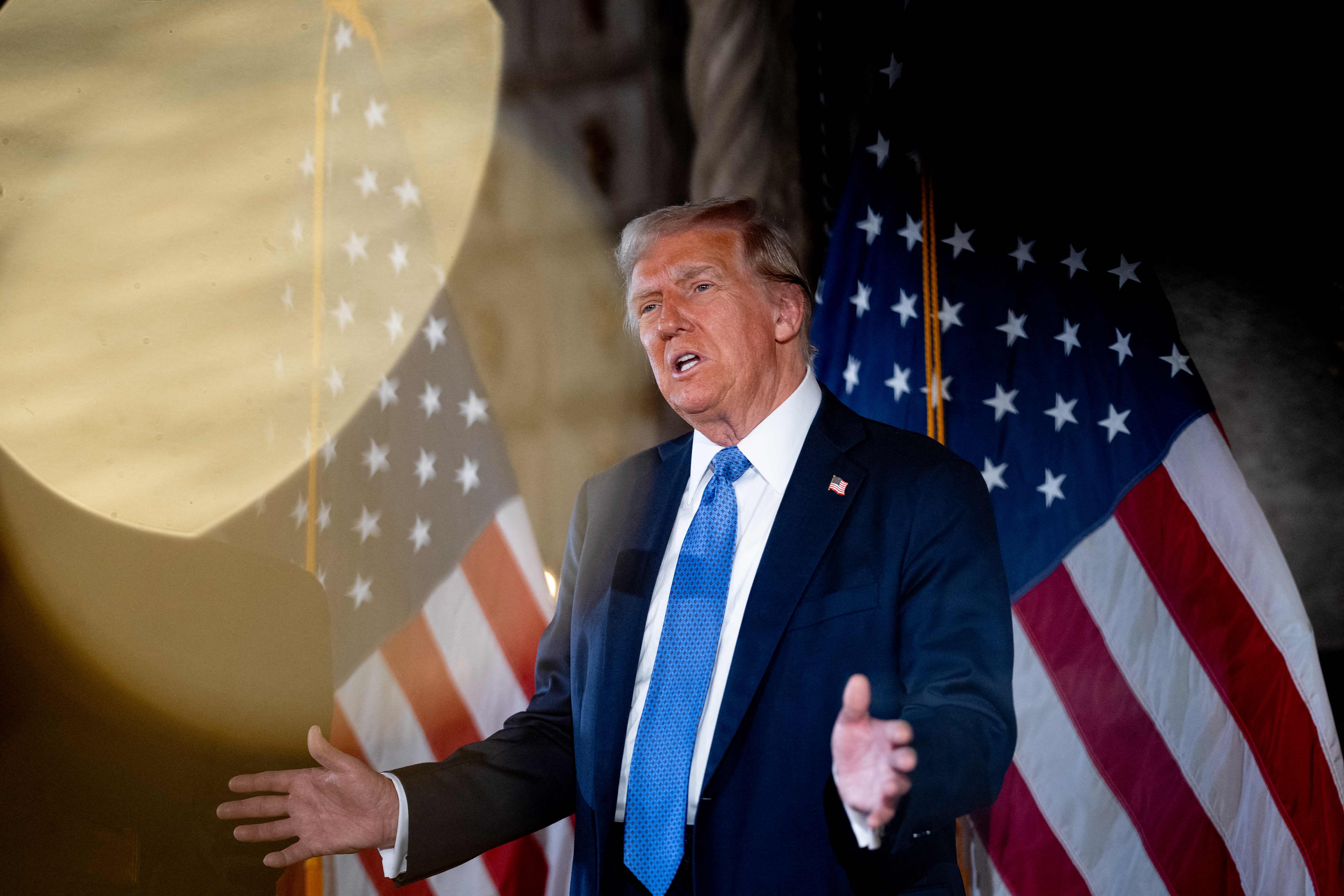 PALM BEACH, FLORIDA - DECEMBER 16: U.S. President-elect Donald Trump speaks at a news conference at Trump's Mar-a-Lago resort on December 16, 2024 in Palm Beach, Florida. In a news conference that went over an hour, Trump announced that SoftBank will invest over $100 billion in projects in the United States including 100,000 artificial intelligence related jobs and then took questions on Syria, Israel, Ukraine, the economy, cabinet picks, and many other topics.   Andrew Harnik/Getty Images/AFP (Photo by Andrew Harnik / GETTY IMAGES NORTH AMERICA / Getty Images via AFP)