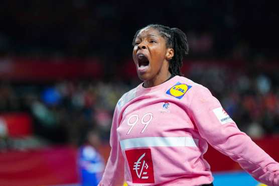 France's goalkeeper #99 Hatadou Sakho reacts during the Women's semi-final of the European EHF EURO 2024 Handball Championship between France and Denmark in Vienna, Austria, on December 13, 2024. (Photo by Eva MANHART / APA / AFP) / Austria OUT