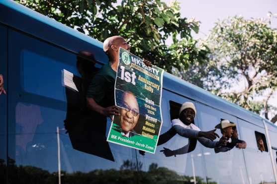 Supporters of the Umkhonto We Sizwe (MKP) party arrive for the first anniversary of the party at the Moses Mabhida stadium  in Durban on December 15, 2024. (Photo by RAJESH JANTILAL / AFP)