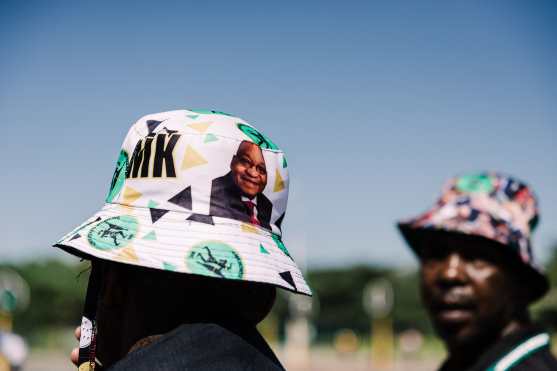 Supporters of the Umkhonto We Sizwe (MKP) party arrive for the first anniversary of the party at the Moses Mabhida stadium  in Durban on December 15, 2024. (Photo by RAJESH JANTILAL / AFP)