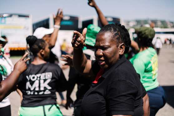 Supporters of the Umkhonto We Sizwe (MKP) party arrive for the first anniversary of the party at the Moses Mabhida stadium  in Durban on December 15, 2024. (Photo by RAJESH JANTILAL / AFP)