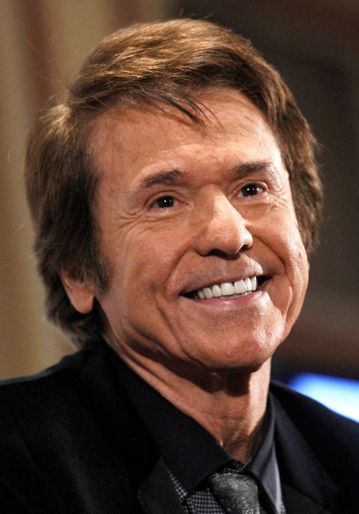 (FILES) Spanish singer Raphael smiles as he gives a press conference during the presentation o(Photo by DOMINIQUE FAGET / AFP)