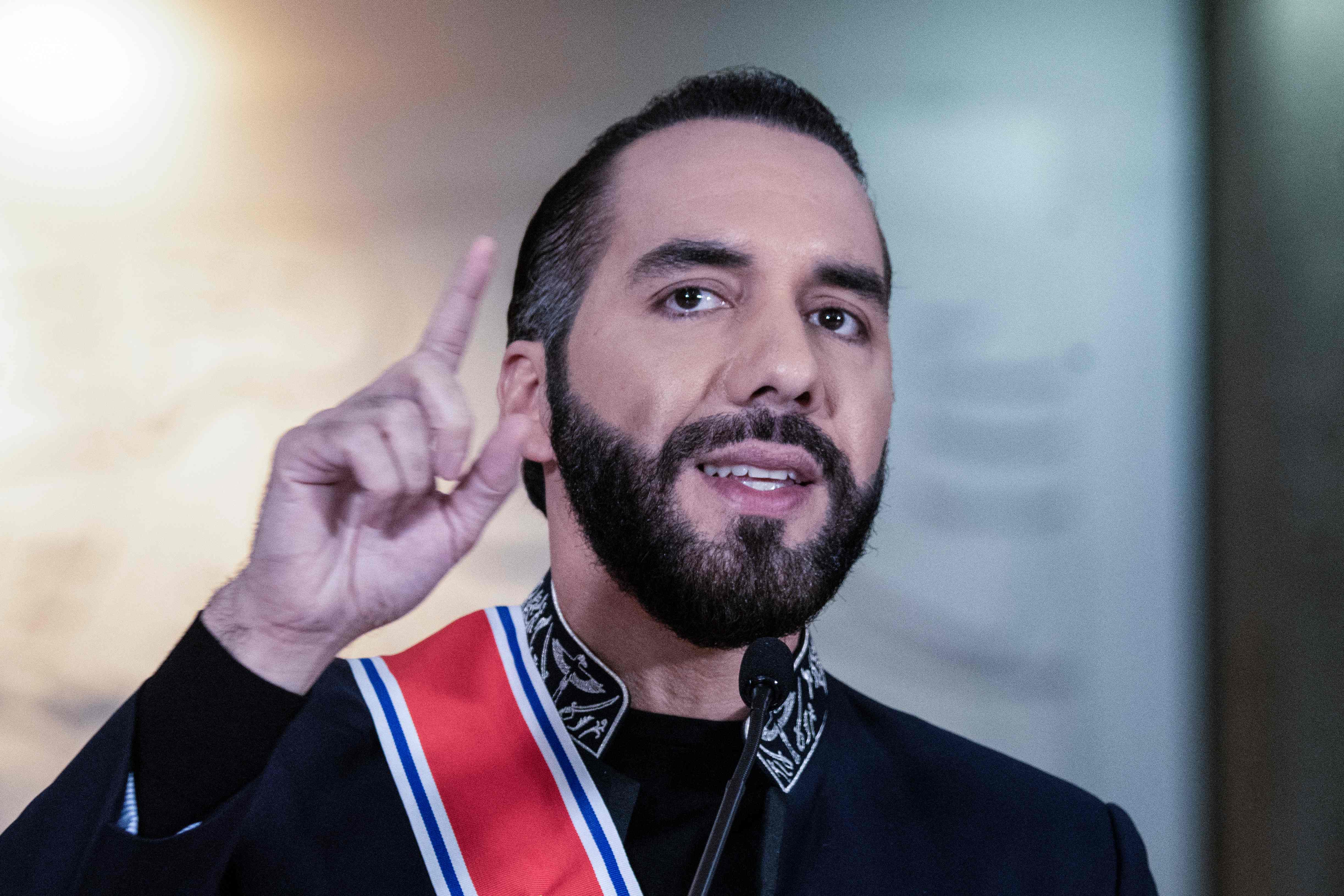 El Salvador's President Nayib Bukele speaks during a joint press conference with Costa Rica's President Rodrigo Chaves, after receiving the decoration of the National Order Juan Mora Fernández at the presidential house in San José on November 11, 2024. (Photo by Ezequiel BECERRA / AFP)