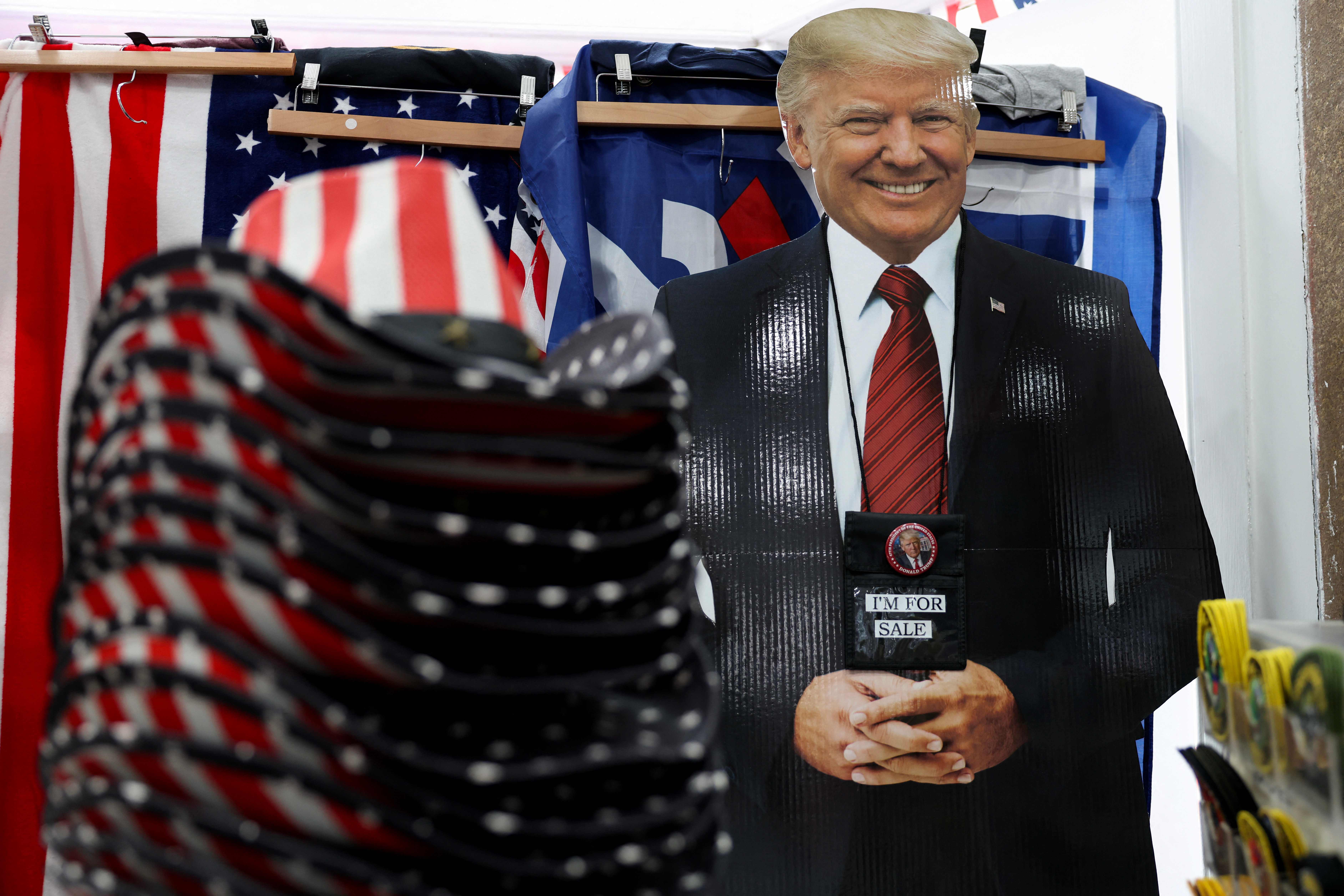 WASHINGTON, DC - JANUARY 16: Donald Trump souvenirs are displayed for sale at of I Love DC Gifts ahead of the Inauguration on January 16, 2025 in Washington, DC. U.S. President-elect Donald Trump and Vice President-elect former Sen. JD Vance (R-OH) will be sworn in on January 20.   Kayla Bartkowski/Getty Images/AFP (Photo by Kayla Bartkowski / GETTY IMAGES NORTH AMERICA / Getty Images via AFP)