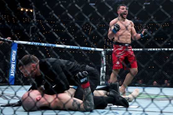 INGLEWOOD, CALIFORNIA - JANUARY 18: Azamat Bekoev of Russia celebrates after knocking out Zachary Reese of the United States in a middleweight fight during UFC 311 at Intuit Dome on January 18, 2025 in Inglewood, California.   Harry How/Getty Images/AFP (Photo by Harry How / GETTY IMAGES NORTH AMERICA / Getty Images via AFP)