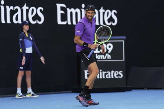 Italys Matteo Berrettini reacts after a point against Denmark's Holger Rune during their men's singles match on day five of the Australian Open tennis tournament in Melbourne on January 16, 2025. (Photo by Adrian Dennis / AFP) / -- IMAGE RESTRICTED TO EDITORIAL USE - STRICTLY NO COMMERCIAL USE --