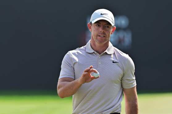 Northern Ireland's Rory McIlroy gestures on first day of the Dubai Desert Classic 2025 golf tournament at the Emirates Golf Club in Dubai on January 16, 2025. (Photo by Giuseppe CACACE / AFP)