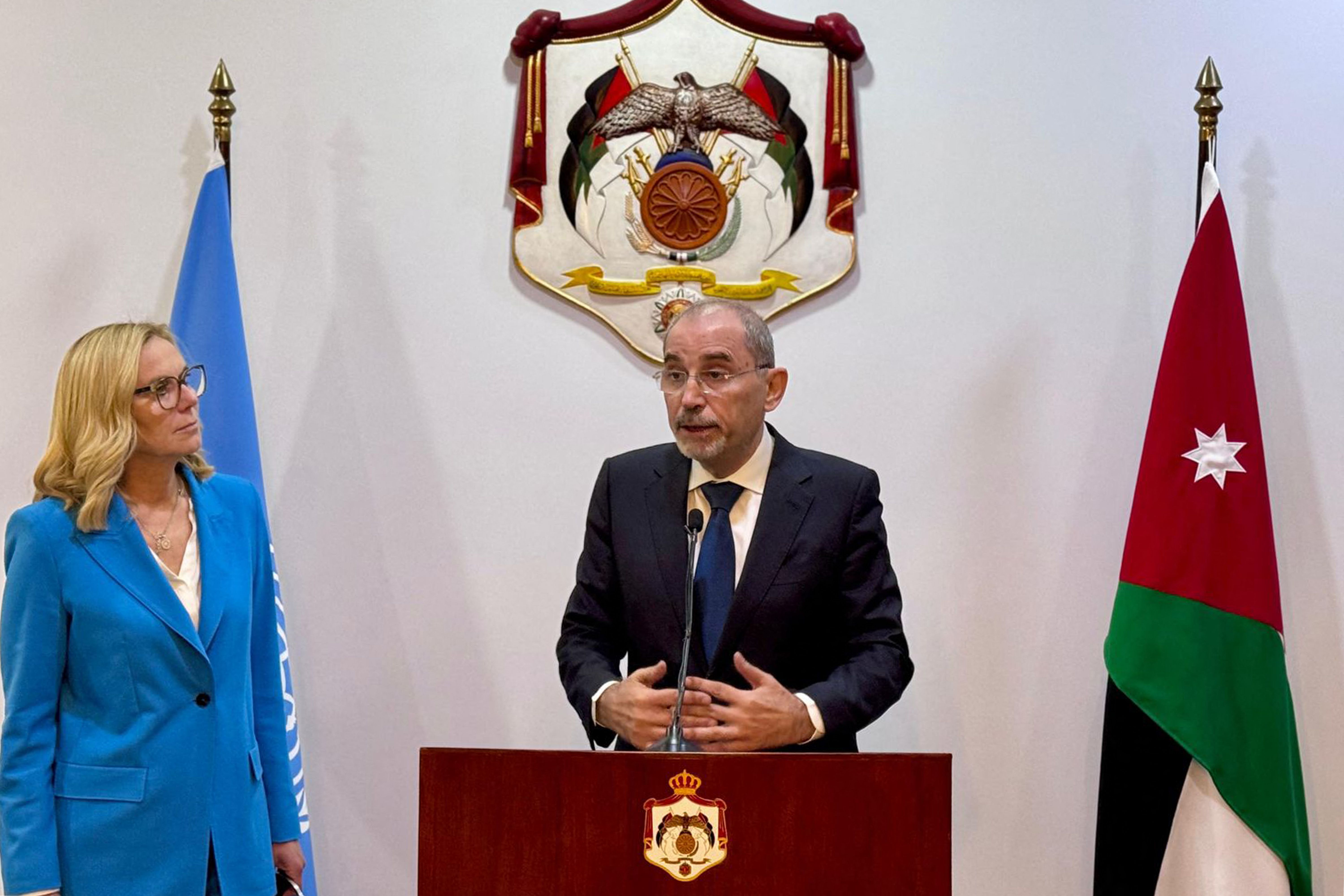 This handout picture released by the Jordanian Foreign Ministry shows Jordan's Foreign Minister Ayman Safadi and the United Nations Senior Humanitarian and Reconstruction Coordinator for Gaza (SHRC) Sigrid Kaag giving a joint press conference in Amman on January 26, 2025. (Photo by AFP) / == RESTRICTED TO EDITORIAL USE - MANDATORY CREDIT "AFP PHOTO / HO / Jordanian Foreign Minister" - NO MARKETING NO ADVERTISING CAMPAIGNS - DISTRIBUTED AS A SERVICE TO CLIENTS ==